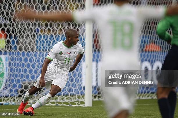 Algeria's midfielder Yacine Brahimi celebrates after scoring his team's fourth goal during the Group H football match between South Korea and Algeria...