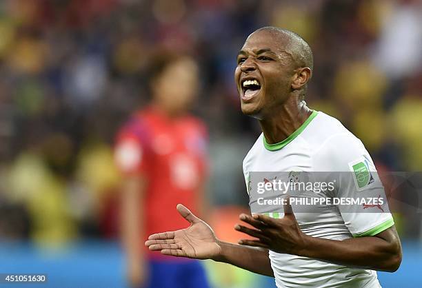 Algeria's midfielder Yacine Brahimi celebrates after scoring his team's fourth goal during the Group H football match between South Korea and Algeria...