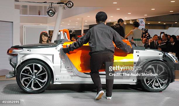 Daihatsu Motor Co's 'Kopen' open-top sports car during the 43rd Tokyo Motor Show at Tokyo Big Sight on November 20, 2013 in Tokyo, Japan. Drivers can...