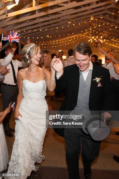 Sarah Darling and James Muriel celebrate their wedding day on May 30, 2014 at Front Porch Farms in Charlotte, Tennessee.