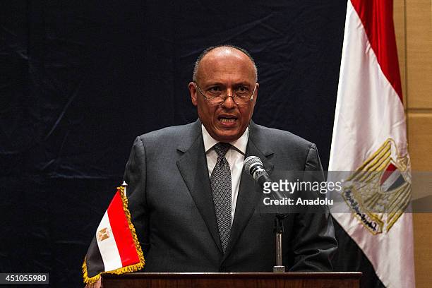 Egypt's Foreign Minister Sameh Hassan Shoukry holds a joint press conference after meeting US Secretary of State John Kerry over latest developments...