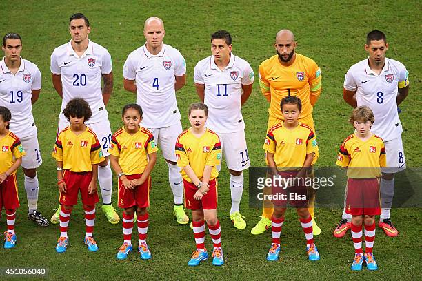 The United States line up for the National Anthems during the 2014 FIFA World Cup Brazil Group G match between the United States and Portugal at...