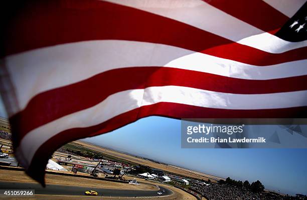 David Gilliland, driver of the Love's Travel Stops Ford, drives during the NASCAR Sprint Cup Series Toyota/Save Mart 350 at Sonoma Raceway on June...