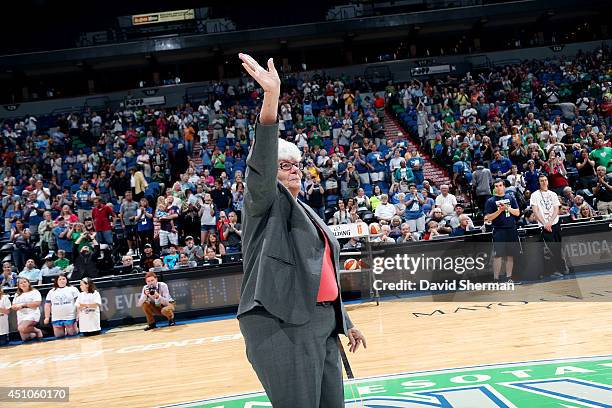 Lin Dunn Head Coach of the Indiana Fever acknowledges fans before a game against the Minnesota Lynx on June 22, 2014 at Target Center in Minneapolis,...