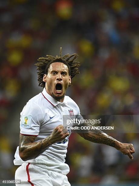 Midfielder Jermaine Jones celebrates after scoring during a Group G football match between USA and Portugal at the Amazonia Arena in Manaus during...