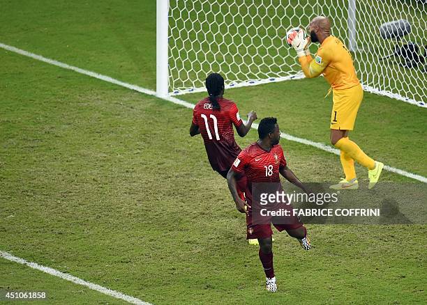 Goalkeeper Tim Howard reacts after Portugal's forward Silvestre Varela scored during a Group G football match between USA and Portugal at the...