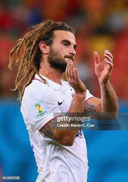 Kyle Beckerman of the United States acknowledges the fans after a 2-2 draw with Portugal during the 2014 FIFA World Cup Brazil Group G match between...