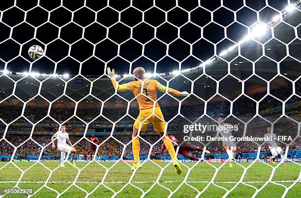 Silvestre Varela of Portugal scores the team's second goal past Tim Howard of the United States during the 2014 FIFA World Cup Brazil Group G match...