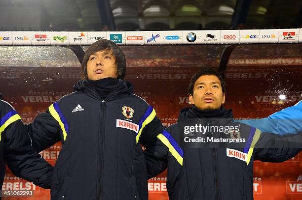 Yasuhito Endo and Yuto Nagatomo are seen on the bench prior to the international friendly match between Belgium and Japan at King Baudouin Stadium on...
