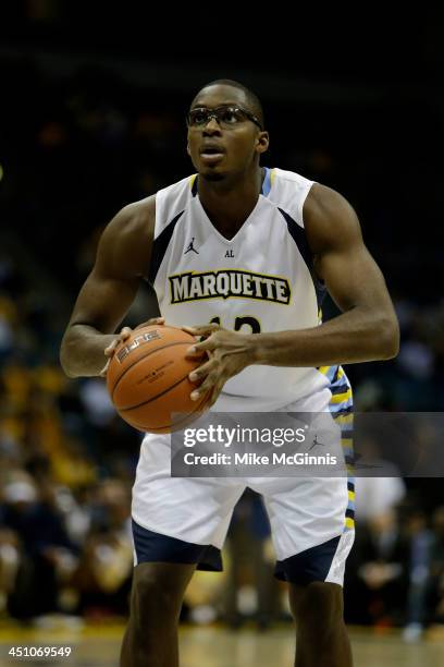 Chris Otule of the Marquette Golden Eagles shots a free throw during the game against the Southern Jaguars at BMO Harris Bradley Center on November...