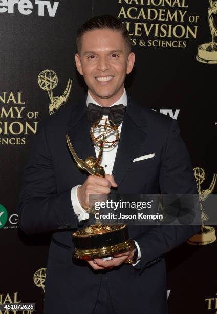 Stylist Rodner Figueroa poses with the Outstanding Daytime Talent in Spanish award for 'El Gordo y la Flaca' during The 41st Annual Daytime Emmy...
