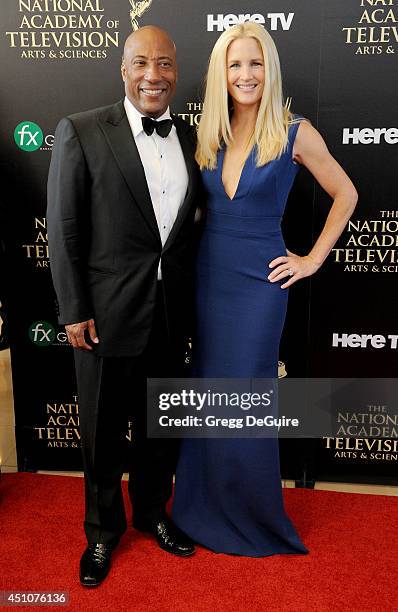 Byron Allen and Jennifer Lucas arrive at the 41st Annual Daytime Emmy Awards at The Beverly Hilton Hotel on June 22, 2014 in Beverly Hills,...