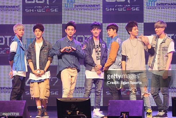 Pose for photographs during their 2nd album showcase at AX-KOREA on June 18, 2014 in Seoul, South Korea.