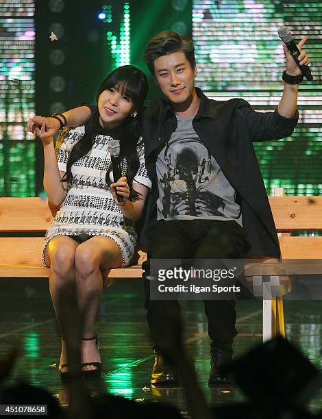 Of After School and San E perform onstage during the Mnet 'M Count Down' at CJ E&M Center on June 19, 2014 in Seoul, South Korea.