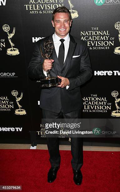 Actor Billy Miller attends the press room at the 41st Annual Daytime Emmy Awards at The Beverly Hilton Hotel on June 22, 2014 in Beverly Hills,...