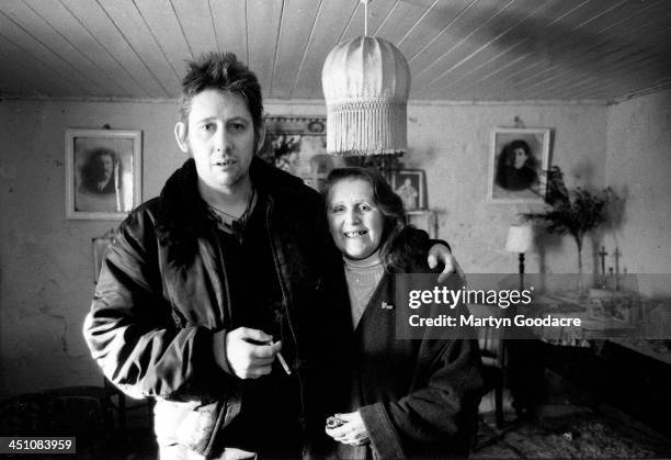 Singer and musician Shane MacGowan, of the Pogues, with his mother, Therese, at the family home in Nenagh, Tipperary, Ireland, 1997. MacGowan's...