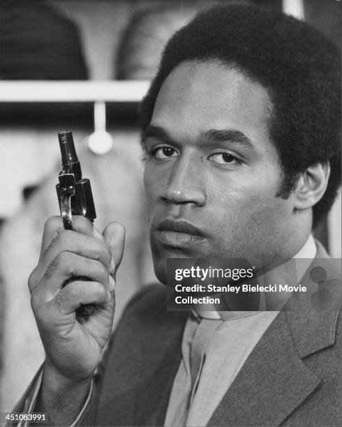 Promotional headshot of actor O. J. Simpson as he appears in the movie 'The Cassandra Crossing', 1976.