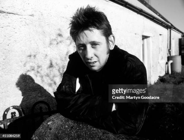Singer and musician Shane MacGowan, of the Pogues, at the family home in Nenagh, Tipperary, Ireland, 1997. MacGowan's parents moved back to Ireland...