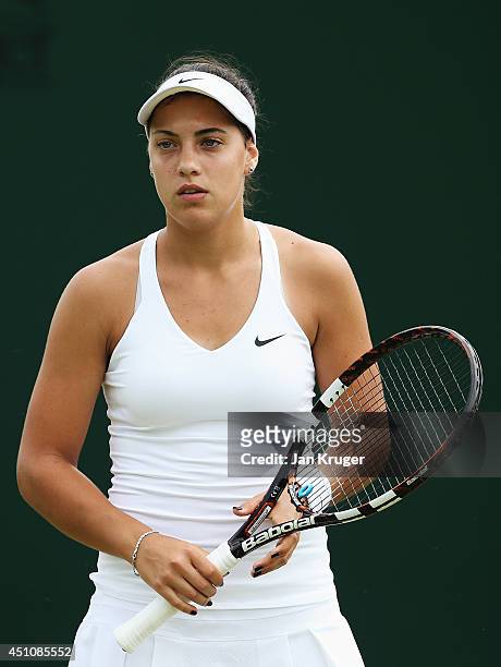 Ana Konjuh of Croatia in action during the Ladies' Singles first round match against Marina Erakovic of New Zealand on day one of the Wimbledon Lawn...