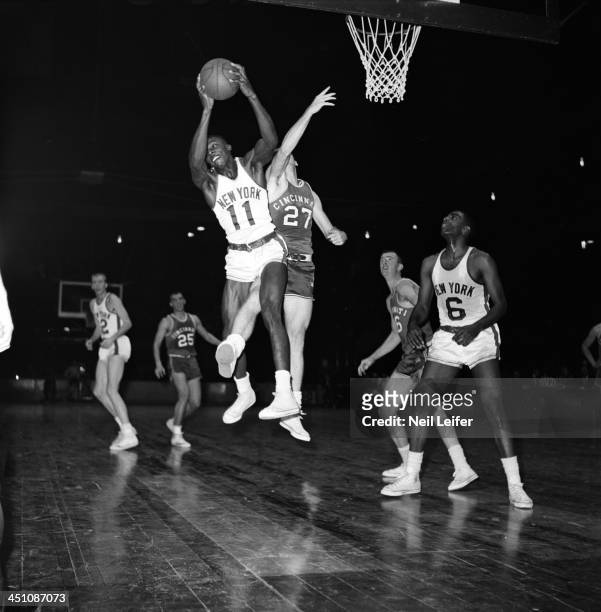New York Knicks Johnny Green in action, getting rebound vs Cincinnati Royals Jack Twyman at Madison Square Garden. New York, NY CREDIT: Neil Leifer