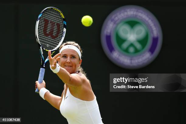Victoria Azarenka of Belarus in action during her Ladies' Singles first round match against Mirjana Lucic-Baroni on day one of the Wimbledon Lawn...