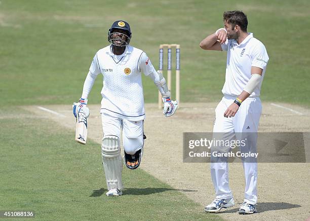 Angelo Mathews of Sri Lanka runs past Liam Plunkett of England as he celebrates reaching his century during day four of 2nd Investec Test match...