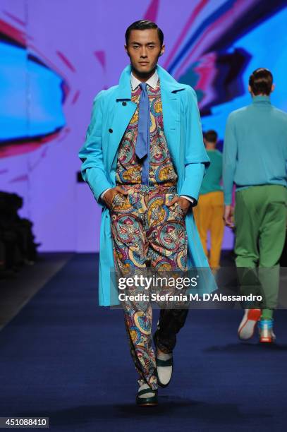 Model walks the runway during the Etro show as part of Milan Fashion Week Menswear Spring/Summer 2015 on June 23, 2014 in Milan, Italy.