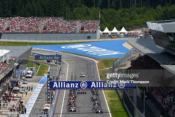 The drivers approach the first corner start the Austrian Formula One Grand Prix at Red Bull Ring on June 22, 2014 in Spielberg, Austria.