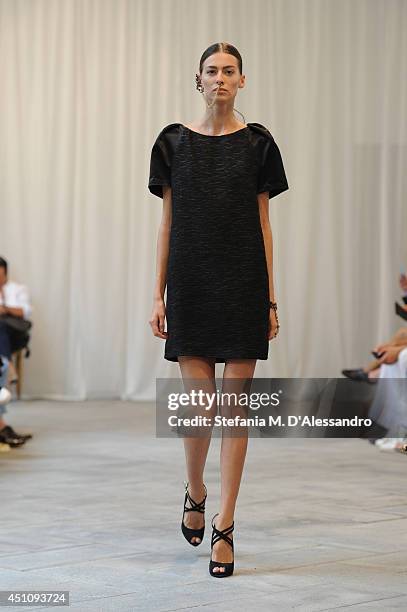 Model walks the runway during the Messagerie show as part of Milan Fashion Week Menswear Spring/Summer 2015 on June 23, 2014 in Milan, Italy.