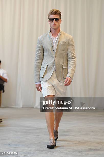 Model walks the runway during the Messagerie show as part of Milan Fashion Week Menswear Spring/Summer 2015 on June 23, 2014 in Milan, Italy.