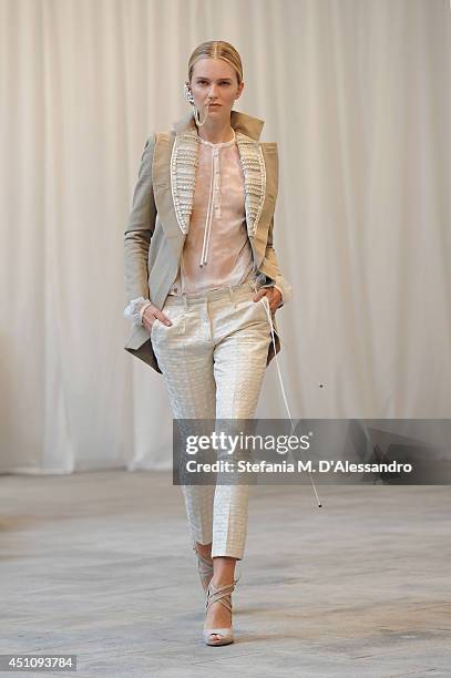 Model walks the runway during the Messagerie show as part of Milan Fashion Week Menswear Spring/Summer 2015 on June 23, 2014 in Milan, Italy.