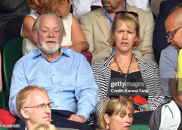 David Jason and Gill Hinchcliffe attend the Andy Murray v David Goffin match on centre court during day one of the Wimbledon Championships at...