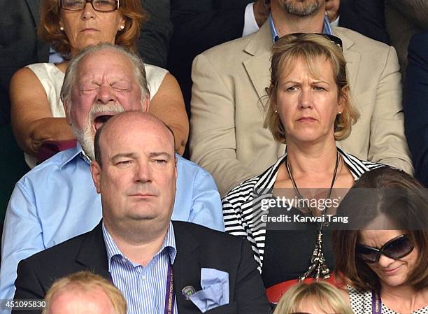 David Jason and Gill Hinchcliffe attend the Andy Murray v David Goffin match on centre court during day one of the Wimbledon Championships at...