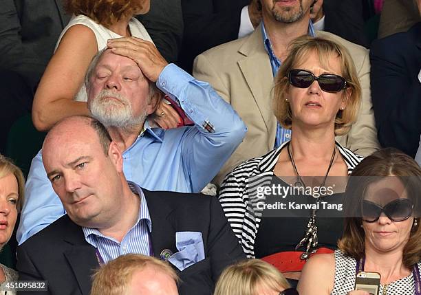 David Jason and Gill Hinchcliffe attend the Andy Murray v David Goffin match on centre court during day one of the Wimbledon Championships at...