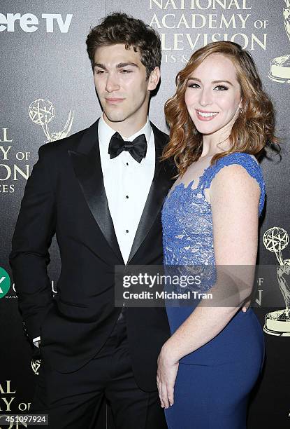 Oliver Singer and Camryn Grimes arrive at the 41st Annual Daytime Emmy Awards held at The Beverly Hilton Hotel on June 22, 2014 in Beverly Hills,...