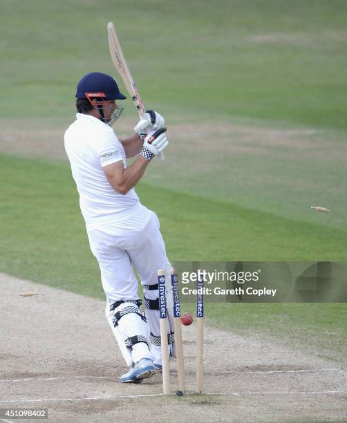 England captain Alastair Cook is bowled by Dhammika Prasad of Sri Lanka during day four of 2nd Investec Test match between England and Sri Lanka at...