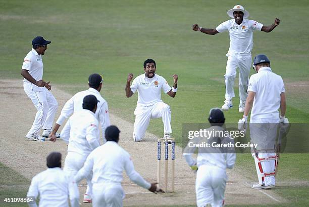 Dhammika Prasad of Sri Lanka celebrates dismissing Gary Ballance of England during day four of 2nd Investec Test match between England and Sri Lanka...