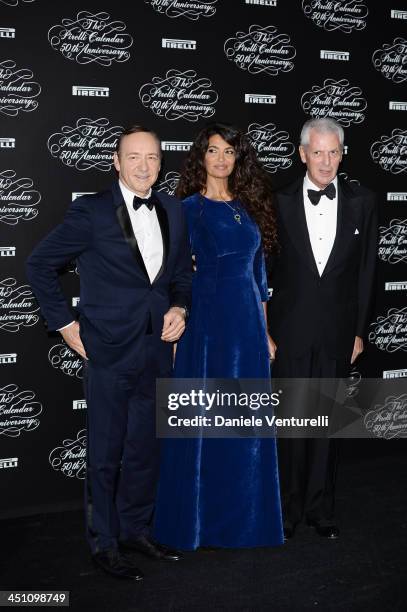 Kevin Spacey, Afef Jnifen, Marco Tronchetti Provera attend the Pirelli Calendar 50th Anniversary Red Carpet on November 21, 2013 in Milan, Italy.