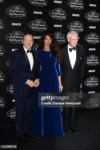 Kevin Spacey, Afef Jnifen, Marco Tronchetti Provera attend the Pirelli Calendar 50th Anniversary Red Carpet on November 21, 2013 in Milan, Italy.