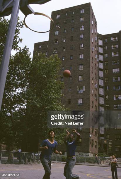 Portrait of Kansas City-Omaha Kings "Tiny" Nate Archibald in action during pickup game at playground of Lester Patterson Houses. Archibald, who lives...