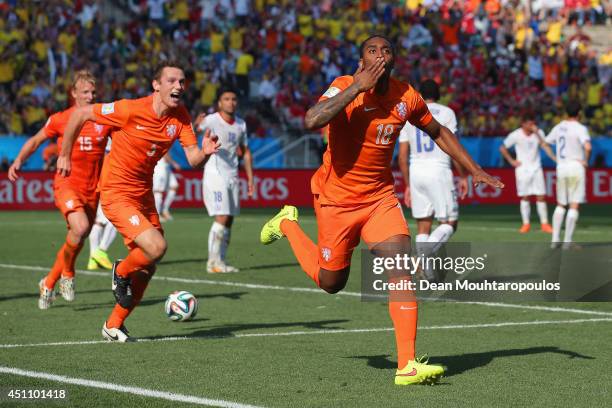 Leroy Fer of the Netherlands celebrates scoring his team's first goal during the 2014 FIFA World Cup Brazil Group B match between the Netherlands and...