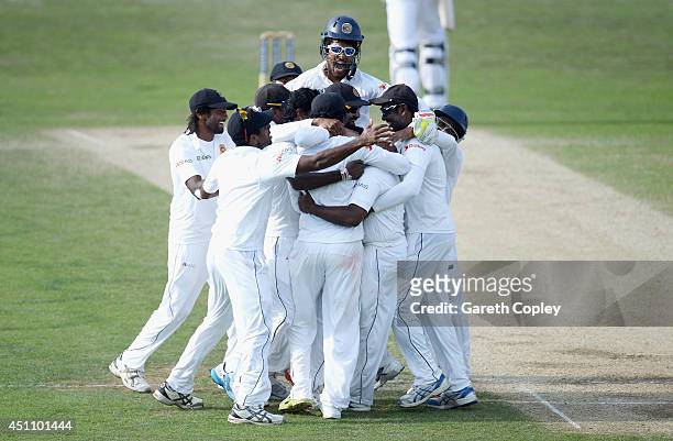 Sri Lankan fielders celebrate after Rangana Herath of Sri Lanka dismissing Liam Plunkett of England during day four of 2nd Investec Test match...