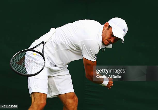 Andreas Haider-Maurer of Austria throws his raquet to the ground in frustration during his Gentlemen's Singles first round match against Kyle Edmund...