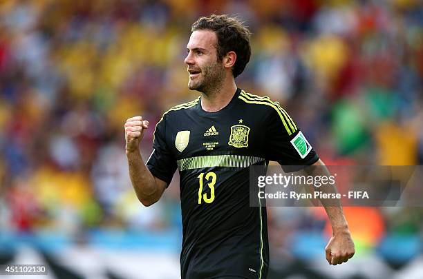 Juan Mata of Spain celebrates scoring his team's third goal during the 2014 FIFA World Cup Brazil Group B match between Australia and Spain at Arena...