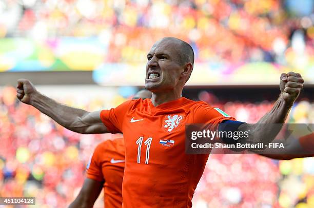 Arjen Robben of the Netherlands celebrates setting up his team's second goal by Memphis Depay during the 2014 FIFA World Cup Brazil Group B match...