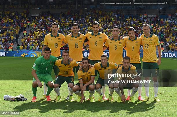 Australia's defender Ryan McGowan, Australia's midfielder Mile Jedinak, Australia's defender Matthew Spiranovic, Australia's defender Jason Davidson,...