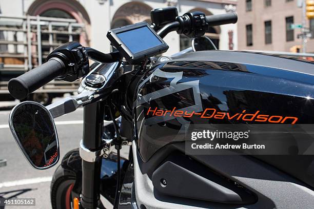 Harley Davidson Livewire motorcycle, Harley Davidson's first electric bike, sits on display outside the Harley Davidson Store on June 23, 2014 in New...