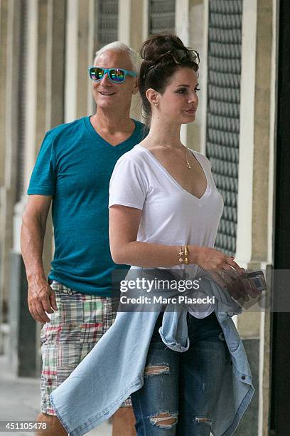 Singer Lana Del Rey and her father Robert Grant are seen at the 'Palais Royal' on June 23, 2014 in Paris, France.