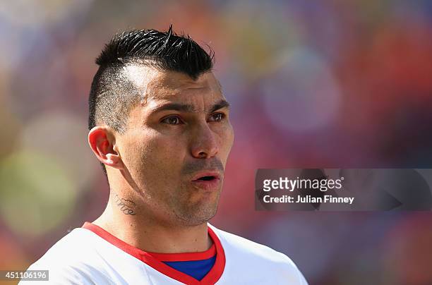 Gary Medel of Chile sings the National Anthem prior to the 2014 FIFA World Cup Brazil Group B match between the Netherlands and Chile at Arena de Sao...