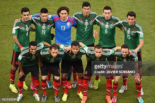 Mexico's defender Rafael Marquez, forward Oribe Peralta, goalkeeper Guillermo Ochoa, defender Francisco Rodriguez, midfielder Hector Herrera,...